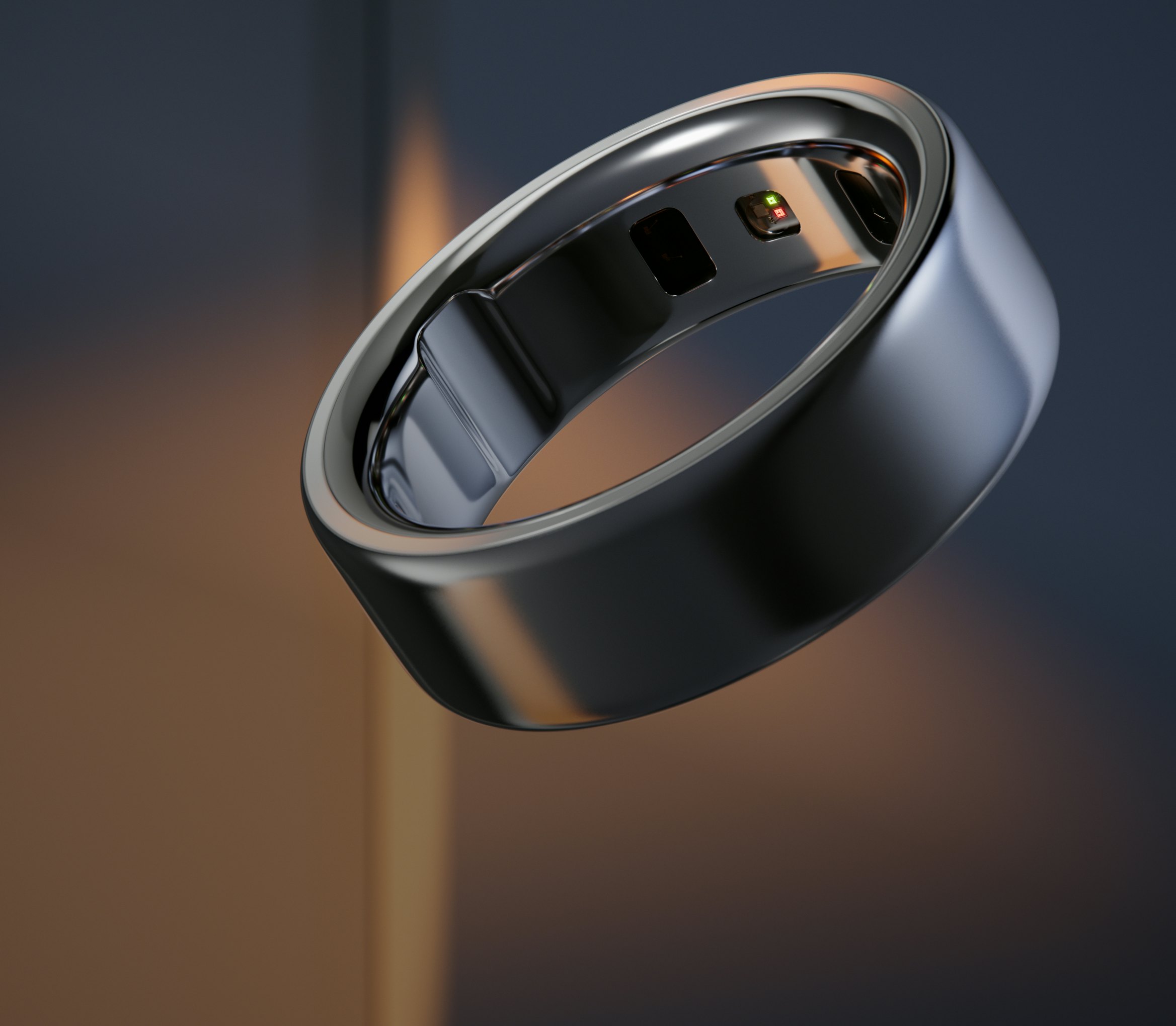 Woman wearing Oura Ring by a body of water